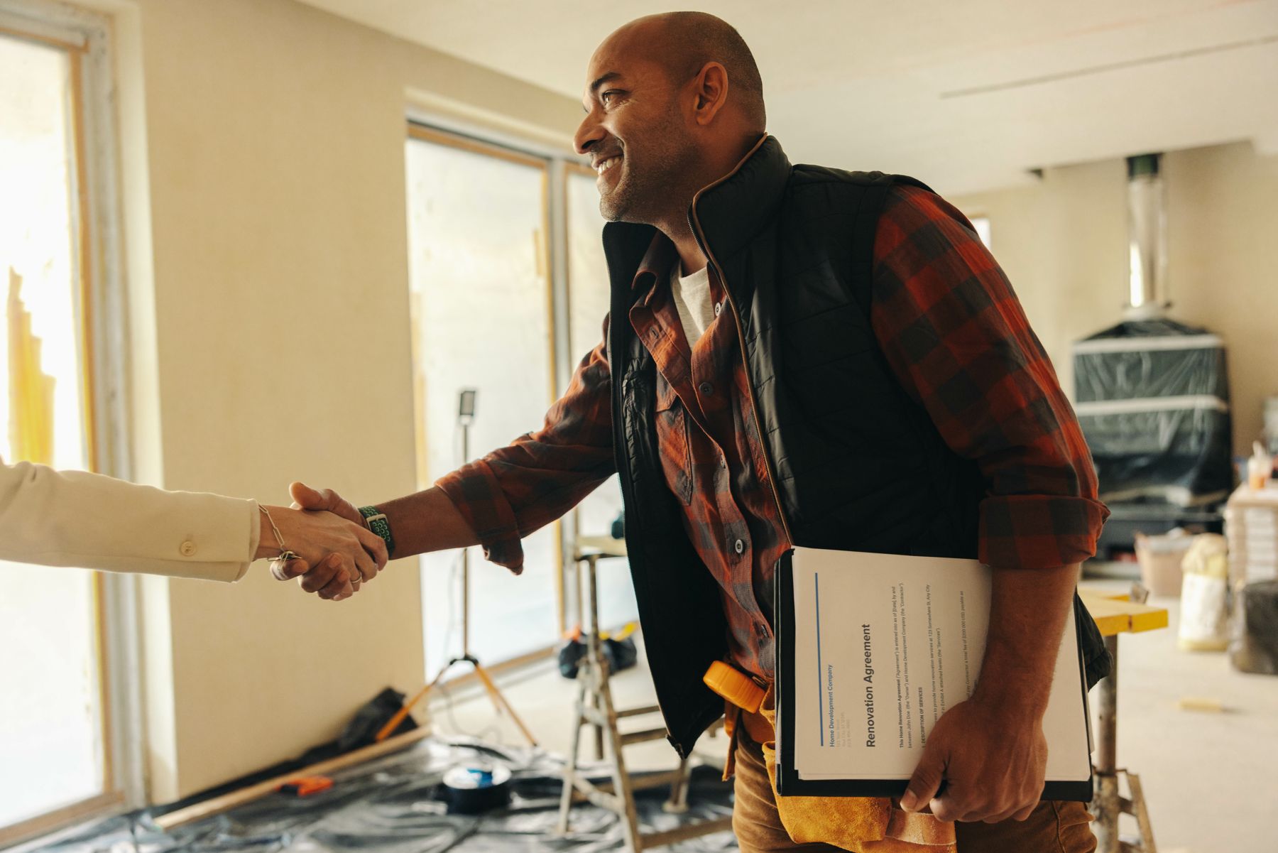 West Bay Mechanical technician greeting a homeowner